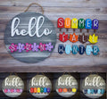 Seasonal interchangeable door hanger