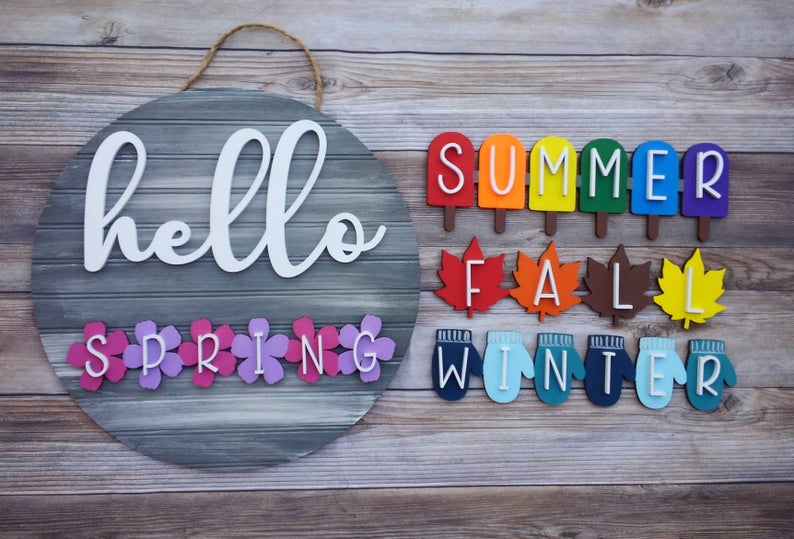 Seasonal interchangeable door hanger